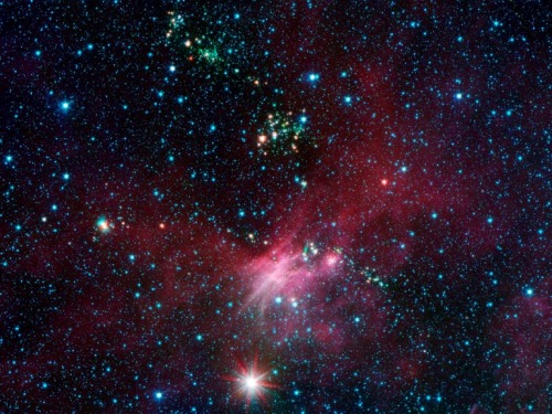 pktechgirlus:Composite image of the area near Canis Major created using data from Spitzer Space Tele
