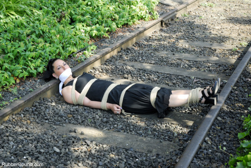 graybandanna:  Damsel in distress tied up on the railroad tracks.