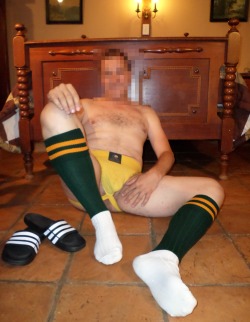 Men in rugby and footy socks