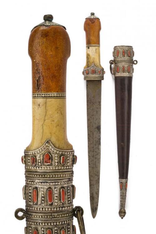 Silver, red coral, and bone mounted Turkish dagger, circa 1900.from Czerny’s International Auction H