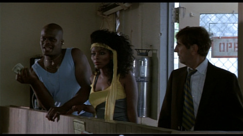 That hair! When they get their car back from Repo Man, she is headed straight to the Thunderdome. 