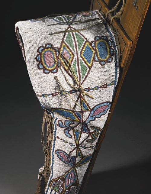 1-2-3 : Kiowa Beaded Hide Doll Cradle, Southern Plains.Hide, glass beadwork, cotton trade cloth lini