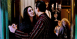 stuckinreversemode:  favorite on-screen couples: gomez & morticia, the addams family and addams family values   ―  just think, someday we’ll be buried here. side by side, six feet under in matching coffins. our lifeless bodies rotting together
