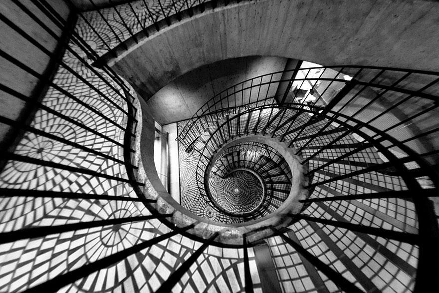 cubebreaker:  These spiral staircase photographs show how design styles differ both