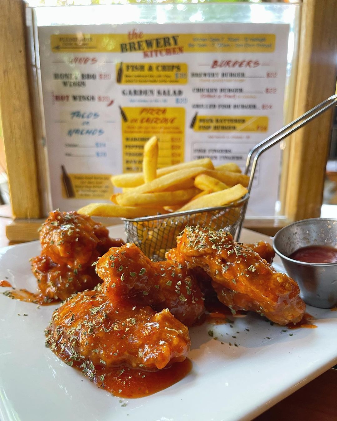 Tried the @westindiesbeer ‘s kitchen for lunch, the hot wings were kicking in a good way. #hotwings🔥 #grenada #puregrenada #freetowonder #islandlife #473 #greenz #caribbean #followgrenada (at The...