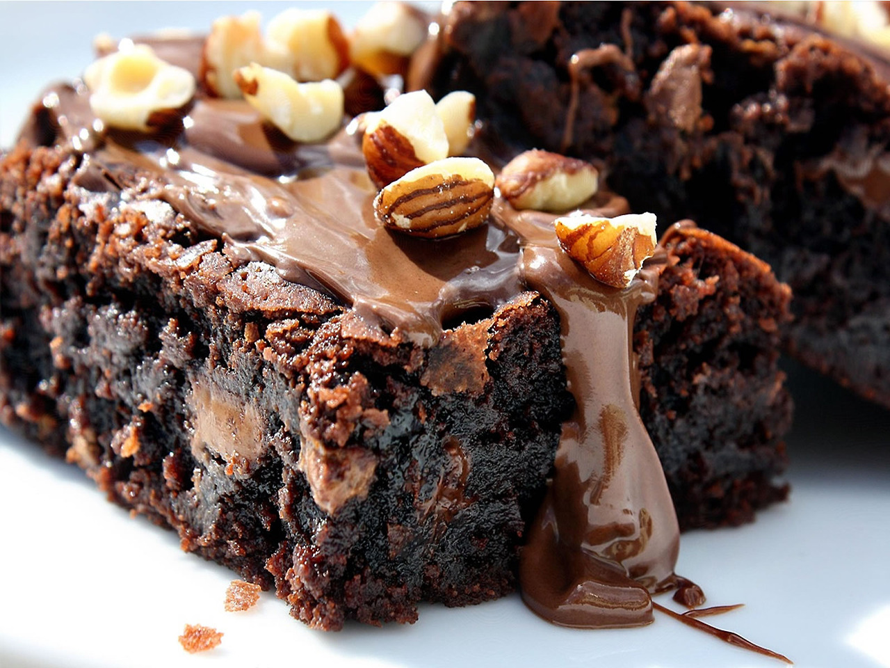 food-porn-diary:  Nutella, caramel and hazelnut brownies [1200×800]