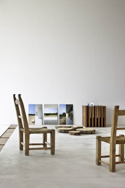 {Minimalist with some cute details… love the ladder thing in the dressing room/hall… a