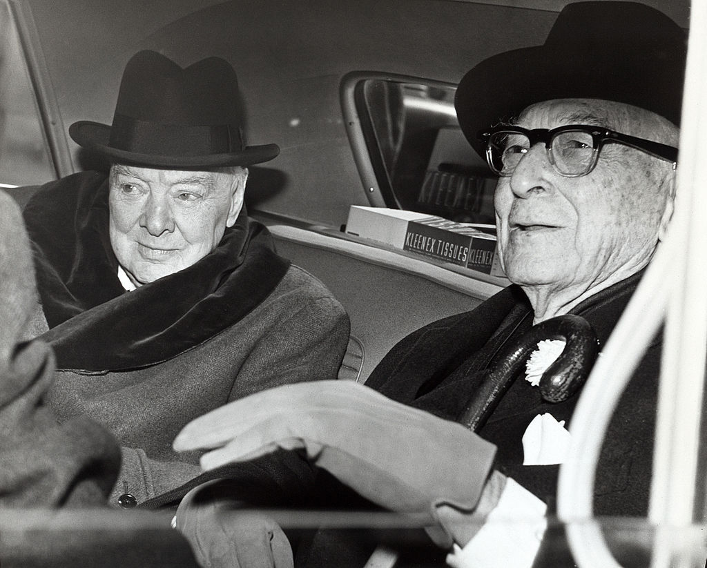 Sir Winston Churchill, British statesman, and Bernard Baruch, financier, converse