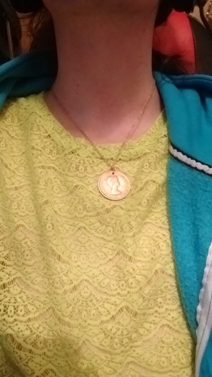 I made a penny shine, and hung it by gold across my breath.In other words, I made a necklace out of an old, 1967 penny. Maybe I’ll buy a couple more hains and make these available for sale or something, because it really is pretty. Plus, I uh…
