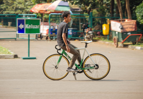 Cyclists of Jakarta - Fauzan Wildan. 18 years young. Avid fixed gear rider. Delivers stuff for Westb