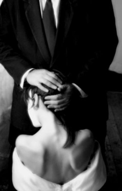 whatapreciouslittlefuckfox:  I love this picture so much. it’s not sexual, it’s sensual. she’s on her knees in front of him, but they’re both (pretty much) fully clothed. he is, as is common, in a suit and tie, fully professional and in charge.