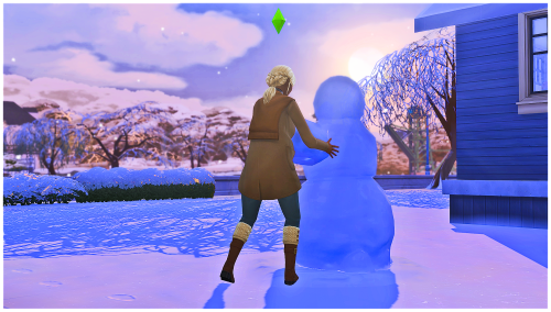 just a pregnant bby building a snowpal as the sun sets