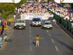 kodiak868:  gaywrites:  When 11,000 people took to the streets in Celaya, Mexico this weekend to protest marriage equality, a 12-year-old boy stood in their way.  Journalist Manuel Rodríguez took this stunning photo, which some people are saying is