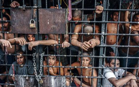 sixpenceee:  Overcrowded Prison in El Salvador Shocking new images have been released of the El Salvador prisons where gang members are held for years in cramped, diseased pits. Although the cells are only designed for a maximum stay of 72-hours, many