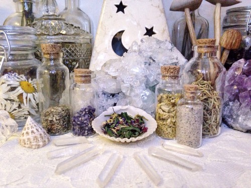 floralwaterwitch: ~ enchanting a special blend of herbs to be used in a water ritual 🐚🕯✨ Instagram angelinnapit / floralsgifts.com  