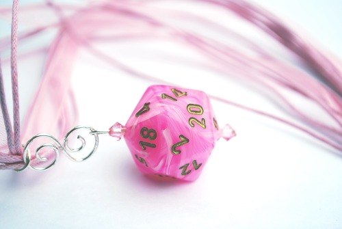 Make a will save to resist the awesomeness of this necklace! This pink pearl swirl necklace is perfe