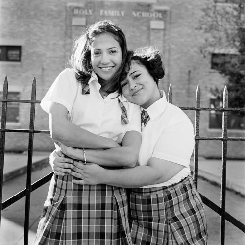 JLo back when she was still Jenny from the Block. In front of her Catholic school with her best frie