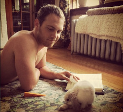 lauren-lopez-is-my-patronus:  Please enjoy this picture of a shirtless Joe Walker reading a book next to a small bunny.