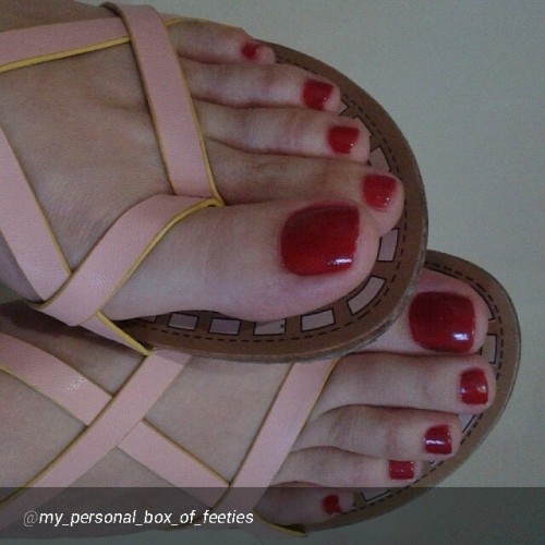 Pink leather Greek style sandals.