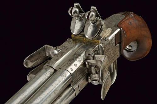 Four shot rotating barrel flintlock pistol produced be Segalas of London, early 19th century.from Cz