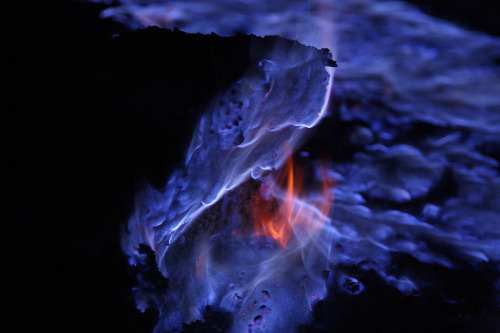 mysticplaces:  Martin Rietze’s photos of the volcano Kawah Ijen in East Java, Indonesia- its sulfer-rich flows and gases rise to temperatures upwards of 600° C, causing the flames to burn a bright, electric blue when viewed at night. photography by