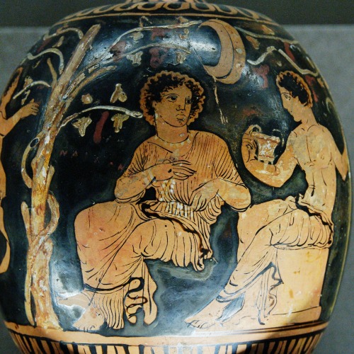 Dionysus (right, holding a kantharos) entertains Ariadne on Naxos; Eros, at far left, encourages the