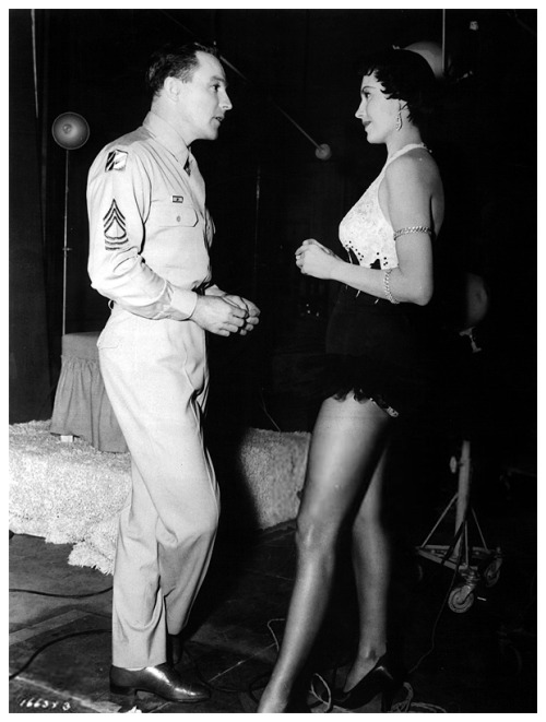 Gene Kelly and Cyd Charisse chat behind the scenes. It’s Always Fair Weather (1955).