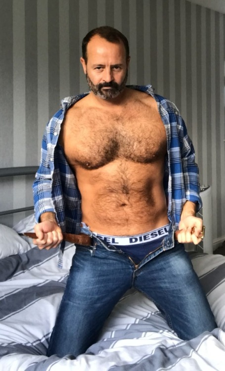 daddysbottom:  {This is a continuation of this story}We barely got into my place and in my bedroom when dad jumped onto the bed and started to rip his clothes off. He was pulling off his belt while his eyes were on me as I shed my own clothes as fast