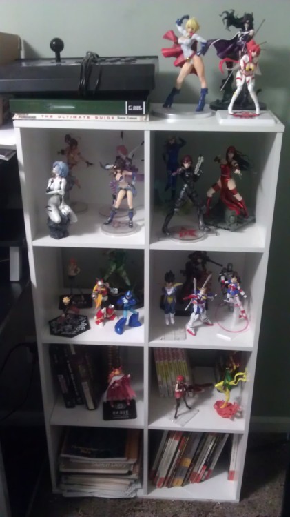 Got four of my six figures today.  I had to rearrange shit to get em to fit on my shelf.  Guess I need to get a bigger shelf or find somewhere else to put my books and other stuff. Female Shepard by Kotobukiya  Alisa Ilinichina Amiella by D-Arts(Bandai)