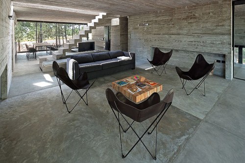 33diors: a minimalistic structure consisting mostly of exposed concrete and built by Luciano Kruk.