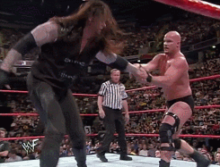wrestlingchampions:  Stone Cold Steve Austin d. The Undertaker &amp;   HHH (w/Chyna) in