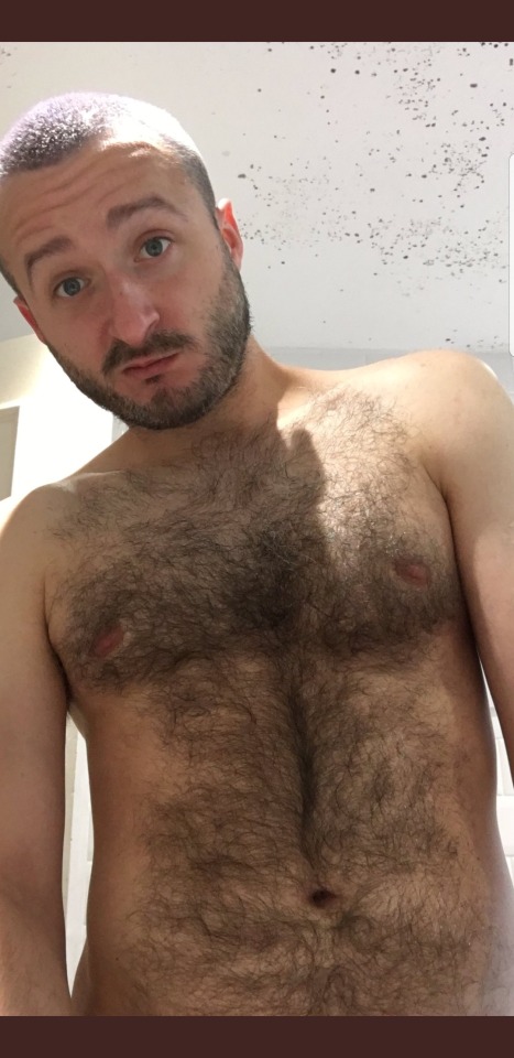 yummy1947:andy9483:This cute young bear cub looks so handsome with his short beard, moustache and cute eyebrows. For such a young bear he’s extremely hairy. His chest is covered with furrr and he has a sexy ‘treasure trail” growing through his hairy