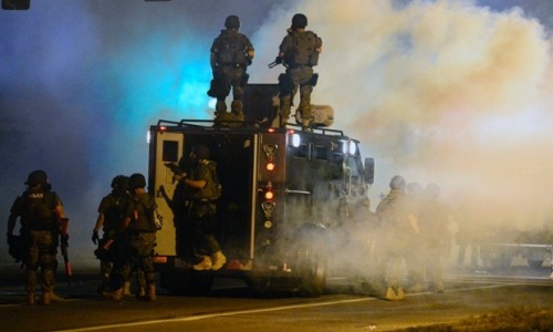 ephitania:
“guardian:
“ Ferguson: Police arrested 31 as they clashed with protesters in another night of gunfire, teargas and chaos in Ferguson 10 days after the shooting of an unarmed teenager ignited an uproar over race in America.
• Read the...