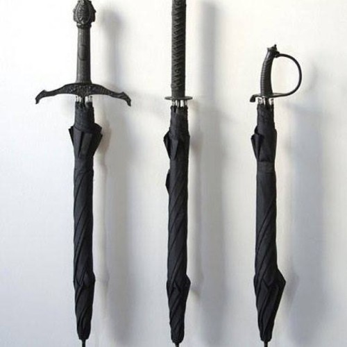 Staying dry in style.#swords #umbrellas #rain #staydry #nerd #geek