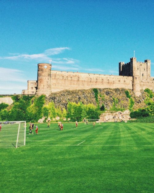 Bamburgh FC has a beautiful backdrop to their home pitch.
