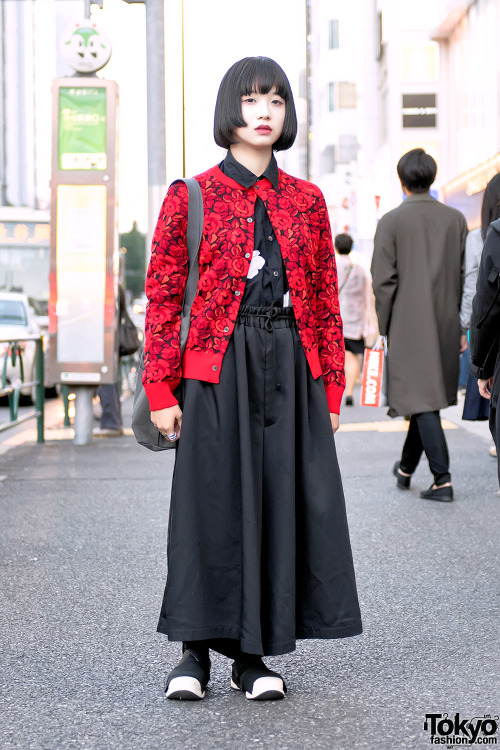 18-year-old Moenon on the street in Harajuku wearing layered tops from Comme Des Garcons with a Yohj