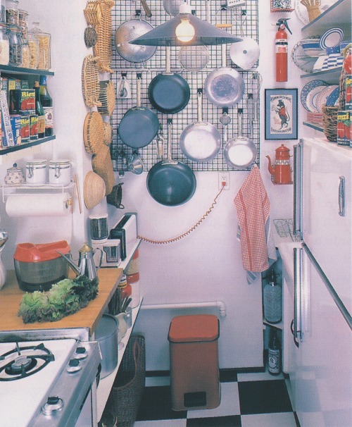 vintagehomecollection: The small space in this kitchen is used efficiently; notice the wall grid and