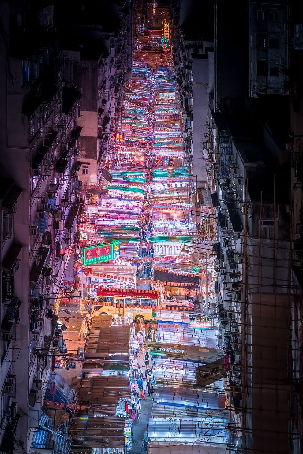 archatlas:      A Midnight Walk Through the Neon-Hued Streets of Asian Cities by