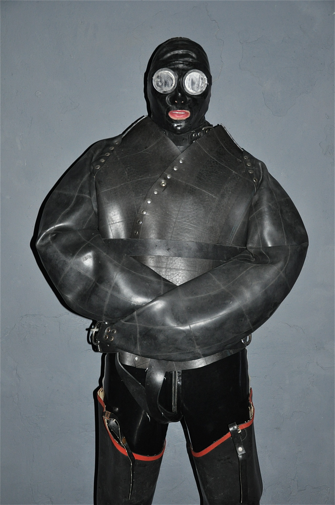 batskin:  This amazing straight jacket is made out of lorries wheels inner tubes.