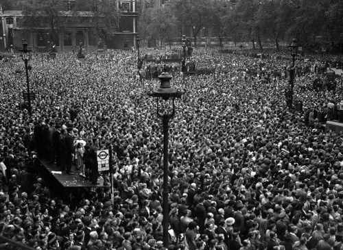 A crowd fillsWhitehall in central London on VE Day (May 8th,1945) to hear the premier officially ann