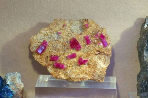 Red beryl on rhyolite matrixDesignated the world’s rarest coloured gemstone in 2006 by the Jew