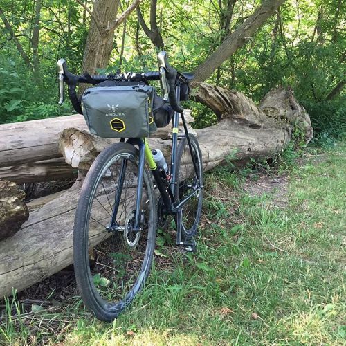 bicyclespecialties:  @apidura handlebar dry bag with accessory pack. Primed for the weekend adventur