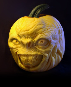 unexplained-events:  John Neill Taking pumpkin carving to a new level.