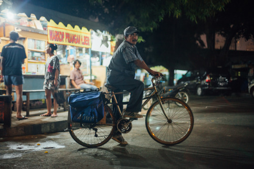 Cyclists of Jakarta - Pak Yanto. Wakes up very early in the morning everyday for the last 20 years t