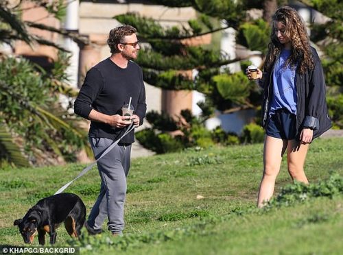 Simon with his daughter Stella walking his dog in Sydney, june 14 2020