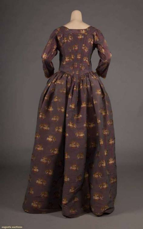 LADIES BROCADED PURPLE SILK OPEN GOWN, AMERICA, 1770-1785Open robe a l'anglaise of aubergine-copper 