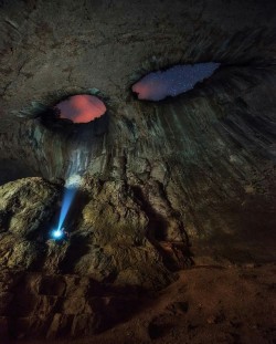 savageslayingsnake4lyfe:  sixpenceee: Prohodna is a karst cave in north central Bulgaria. The cave is known for the two eye-like holes in its ceiling, known as the Eyes of God or Oknata. From here Let us not forget about this iconic image 