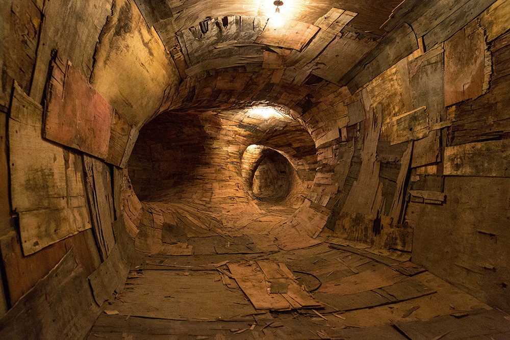 10 - Artist Henrique Oliveira Constructs a Cavernous Network of Repurposed Wood