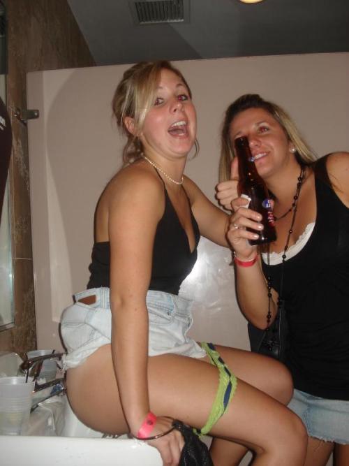 Drunk girls caught peeing