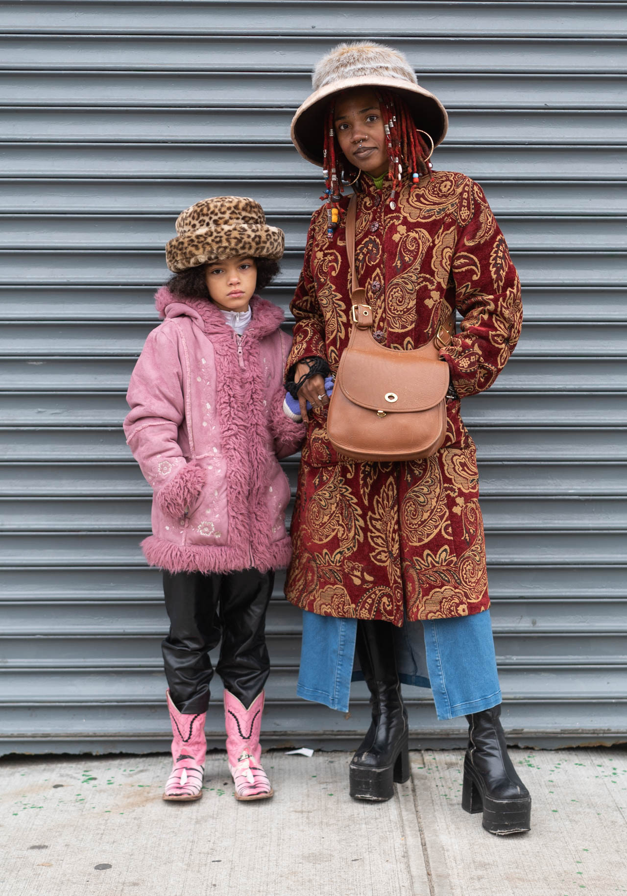 nyc-looks:
“Starr, 31
Grey Iona, 9“It is cold so Grey Iona basically threw on whatever to keep her warm while I was selling vintage at the Hotspot Williamsburg. As a person who lives in the fantasy realm 80% of the time my wardrobe consists of very...